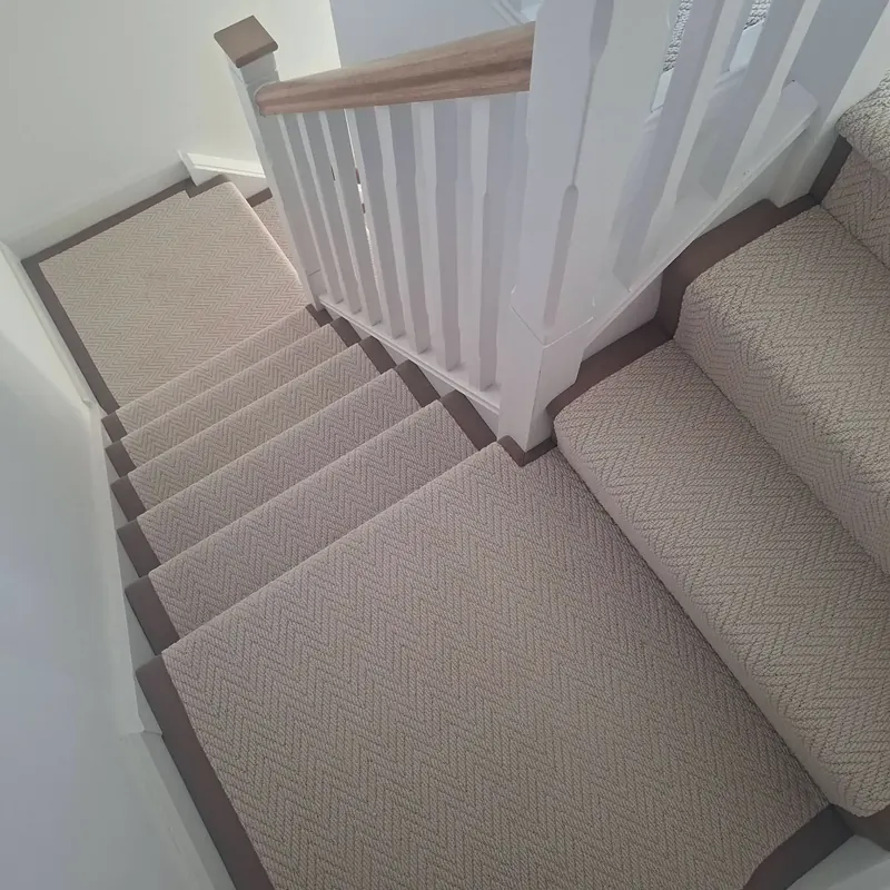 Bespoke carpet stair runner fitted on a staircase